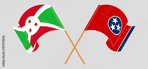 Crossed and waving flags of Burundi and The State of Tennessee