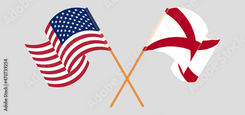Crossed and waving flags of the USA and The State of Alabama