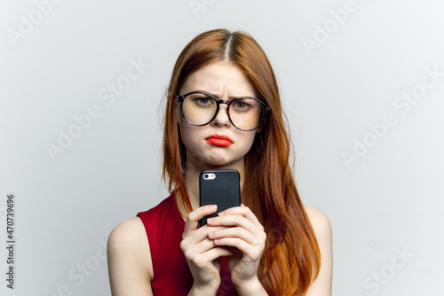 pretty woman with glasses talking on the phone technology lifestyle