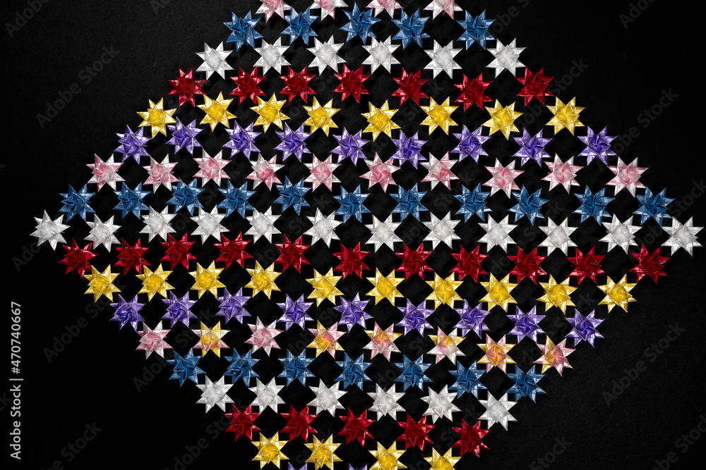 Folding paper stars on Black background. Folding paper stars on Black background.