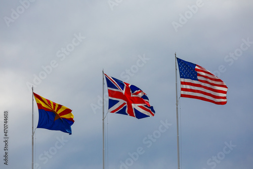 three flags on a windy day 