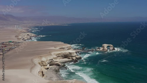 La Portada is a natural arch on the coast of Chile, 18 km (11 mi) north of Antofagasta. It is one of fifteen natural monuments included among the protected areas of Chile.
 photo