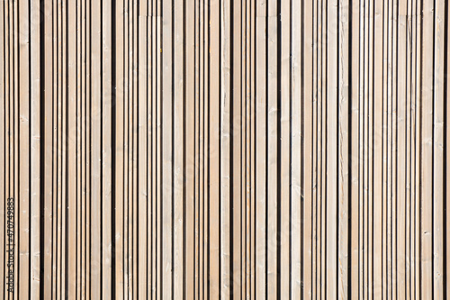 Wood stripes texture. Striped wood pattern. Wooden desks background. Straight vintage lines. Natural brown plank panel. Grunge wooden wall.