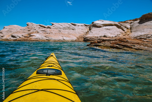 Kayaking in the spring on Lake Powell when the water level is low near Page, Arizona near the Utah border.