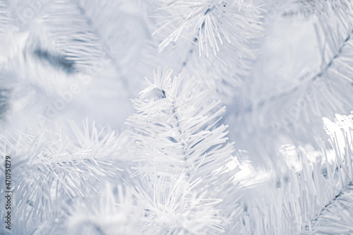 Delicate background of white Christmas Tree close up