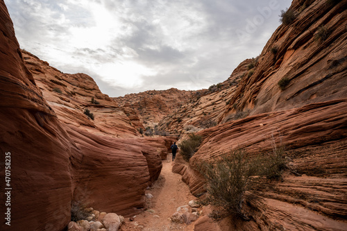 Hiker Heads Into The Beginning Of The Wire Pass Slot Canyon © kellyvandellen