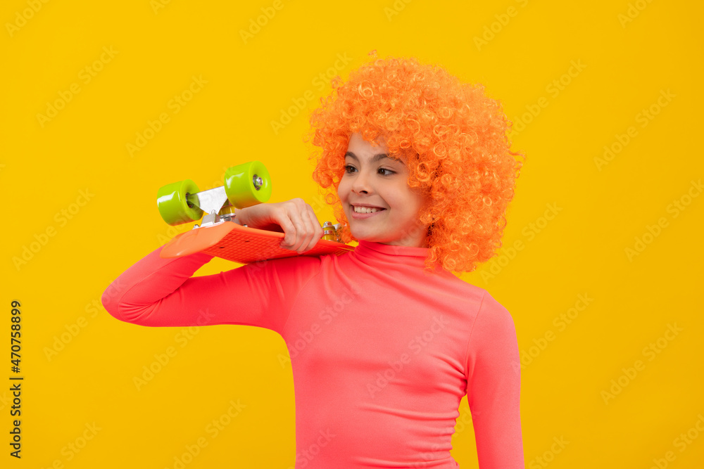 Enjoying vibes on pennyboard. Happy kid hold pennyboard. Funky girl skater Enjoying vibes on pennyboard. Happy kid hold pennyboard. Funky girl skater