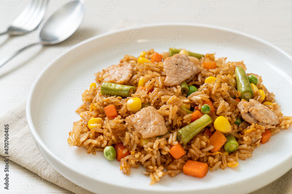 pork fried rice on white plate pork fried rice on white plate
