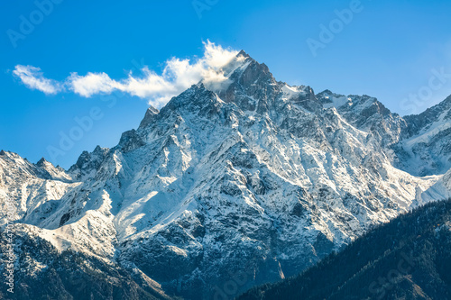 Fototapeta Naklejka Na Ścianę i Meble -  Snow peak of Kinnaur Kailash Himalaya range as viewed from Kalpa Himachal Pradesh, India
