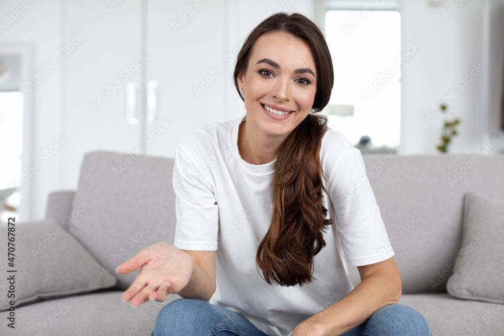 Happy young woman blogger sit at home speaking looking at camera talking make video chat, webcam view. Happy young woman blogger sit at home speaking looking at camera talking make video chat, webcam view.