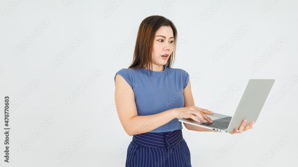 Charming Asian woman carry laptop and attentively typing message for online internet info searching, business news check and communication Charming Asian woman carry laptop and attentively typing message for online internet info searching, business news check and communication
