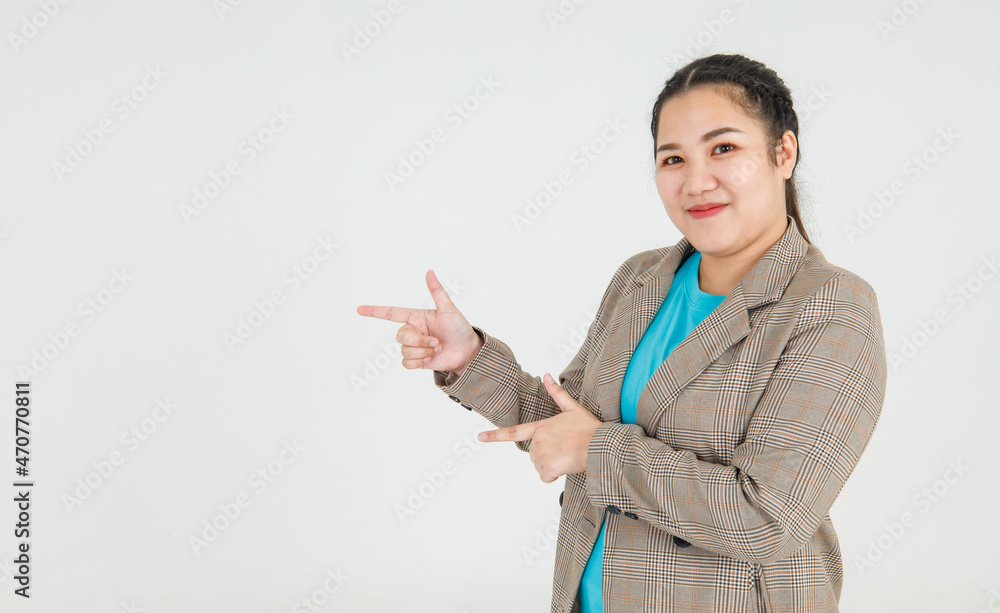 Lively Asian woman confidently pointing fingers to mark exactly correct direction and remarkable guide recommended to fire target Lively Asian woman confidently pointing fingers to mark exactly correct direction and remarkable guide recommended to fire target