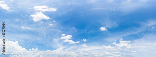 Panorama fluffy clouds against in blue sky © Singha songsak