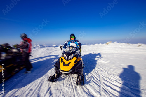 Concept winter sports tour. Snowmobile races in snow