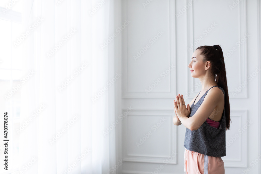 Morning yoga class at home. Praying. Morning yoga class at home. Praying.