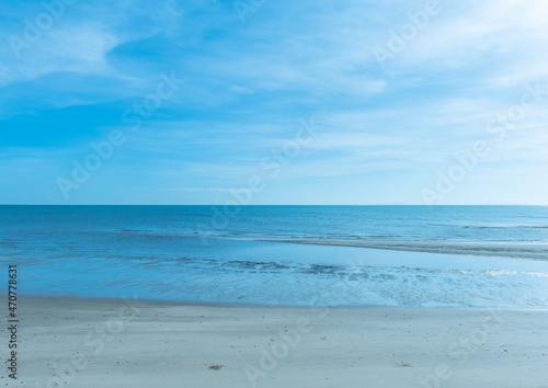 Grey beach and blue sea