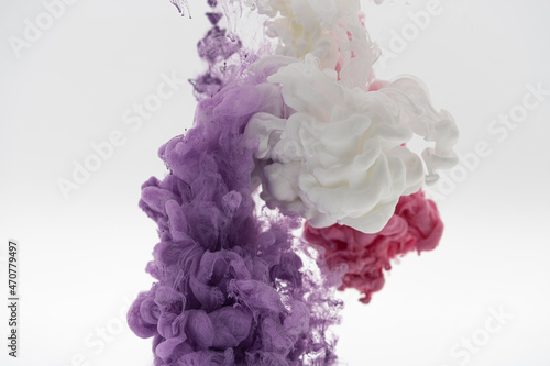 white pink and purple smoke on a white background.