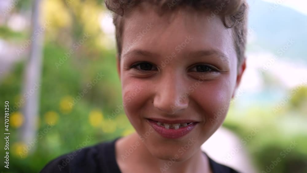 Handsome young boy portrait child smiling at camera outside Handsome young boy portrait child smiling at camera outside