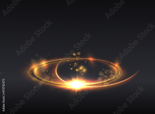 Magical light effect. Rotating luminous ellipses. Dynamic golden rings on black background.