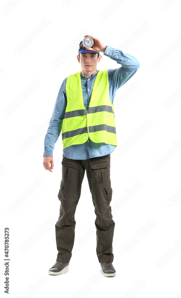 Young male worker with headlamp flashlight on white background Young male worker with headlamp flashlight on white background