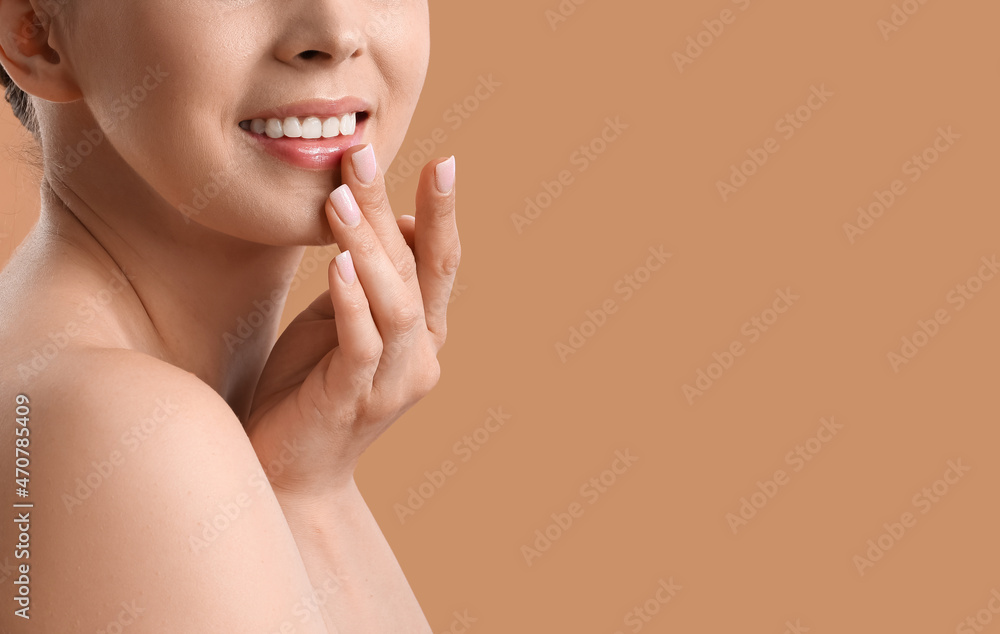 Woman with beautiful manicure and nude makeup on color background, closeup Woman with beautiful manicure and nude makeup on color background, closeup
