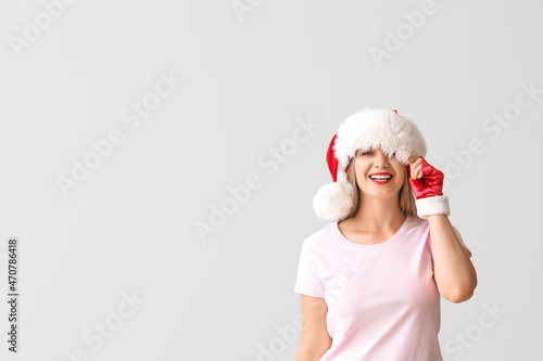 Happy young woman in Santa ...