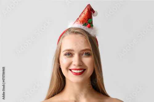 Beautiful young woman with ...