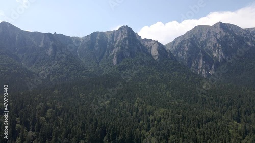 Beautiful aerial shot of the Southern Carpathian and Bucegi Mountains in Romania photo