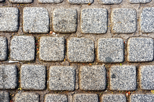 Abstract background of old cobblestone pavement road