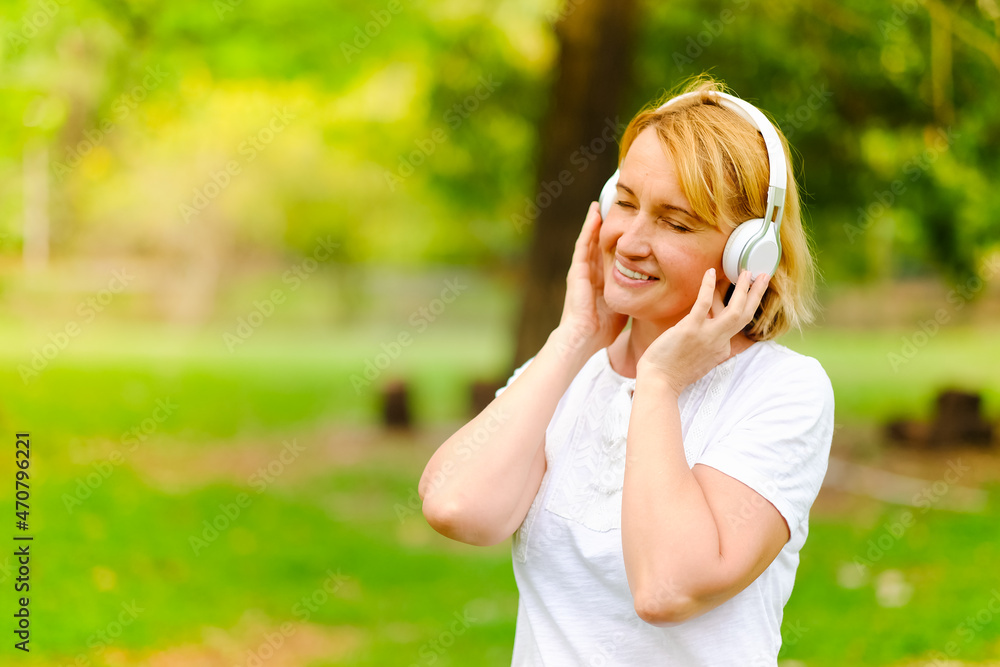 Portrait caucasian senior woman happy in park Portrait caucasian senior woman happy in park