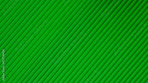 green striped background of corrugated cardboard