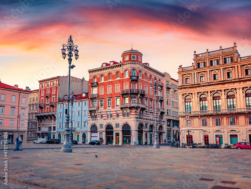 Gorgeous summer sunrise in Trieste, Italy, Europe. Splendid morning view of Piazza del Ponte rosso Town square. Traveling concept background.