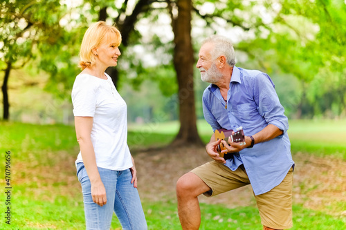 Portrait caucasian senior woman and old man, couple elder in love happy in park © u photostock