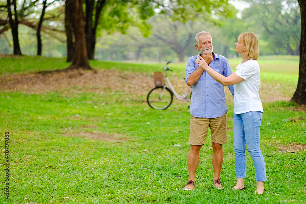 Portrait caucasian senior woman and old man, couple elder in love happy in park