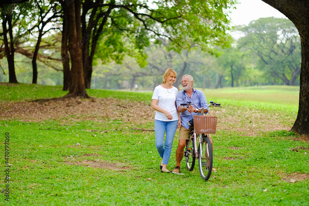 Portrait caucasian senior woman and old man, couple elder in love happy in park Portrait caucasian senior woman and old man, couple elder in love happy in park