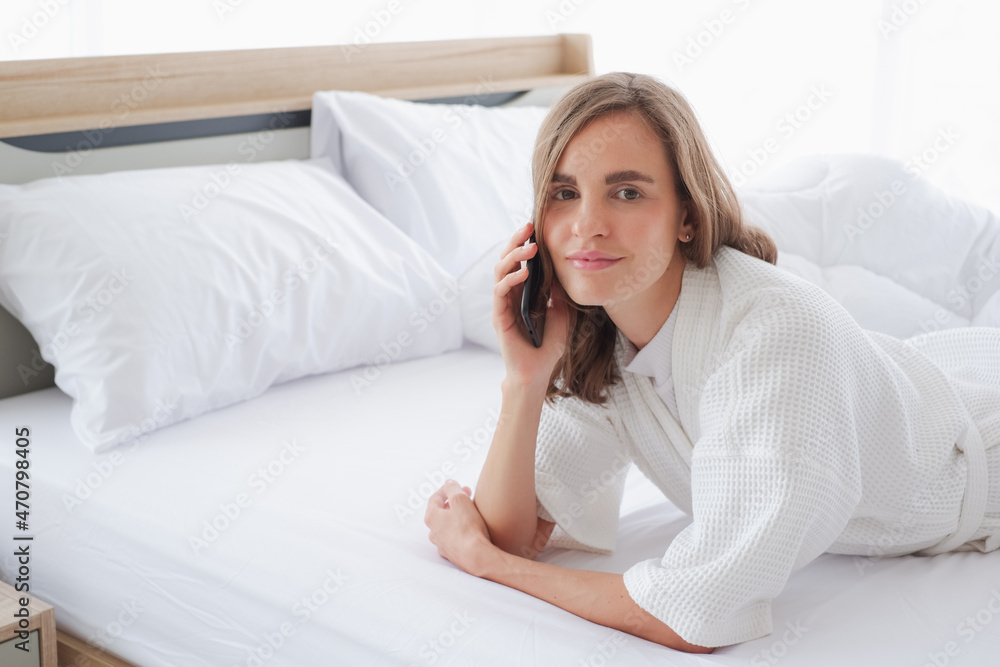 woman relax time on the bed in morning woman relax time on the bed in morning