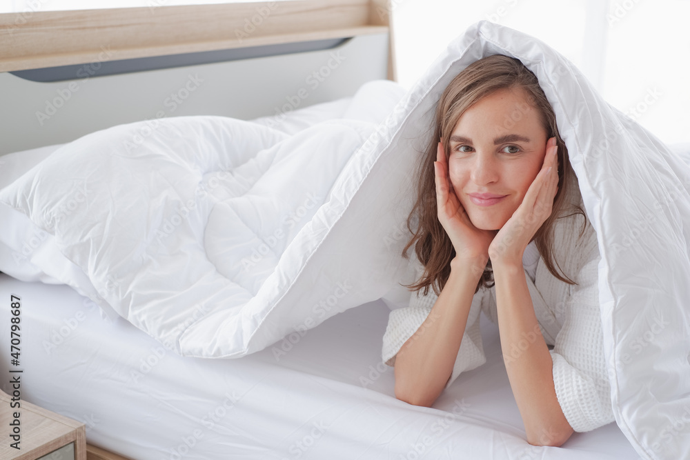 woman relax time on the bed in morning woman relax time on the bed in morning