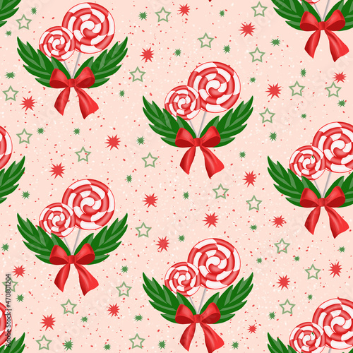lollipop pattern and red bow and green fir branches on pink background
