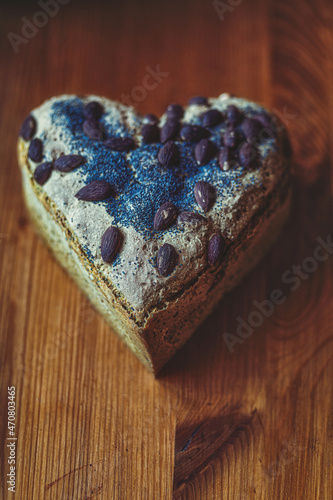 bread shaped srdca with mandle and poppy seeds. photo