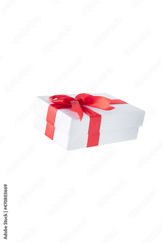 White gift box with red ribbon White gift box with red ribbon