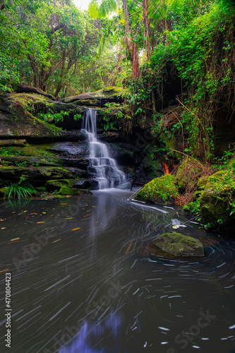 Fototapeta Naklejka Na Ścianę i Meble -  Beautiful small waterfall in the rainforest.