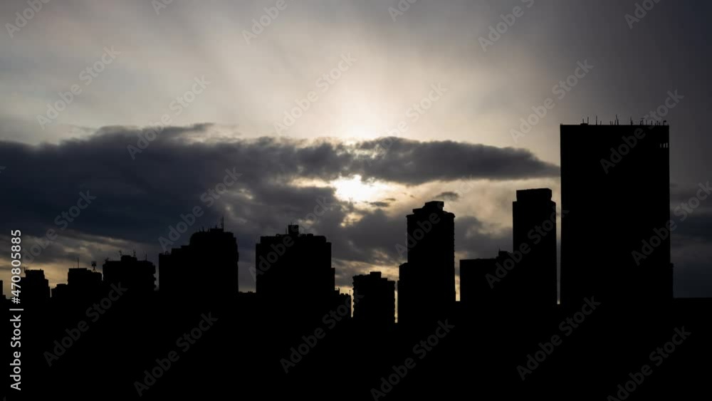 Jeddah at Sunrise, Time Lapse with Fast Clouds and Dark Silhouette of Skyscrapers, Saudi Arabia Jeddah at Sunrise, Time Lapse with Fast Clouds and Dark Silhouette of Skyscrapers, Saudi Arabia