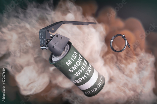 3D render of a hand smoke (gas) grenade in action photo