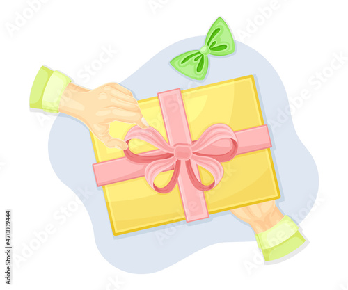 Hands wrapping gift box. Top view of creative work process, hobby and craft concept vector illustration