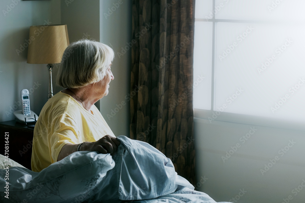 Elderly woman alone at home during social isolation due to Covid-19 pandemic Elderly woman alone at home during social isolation due to Covid-19 pandemic