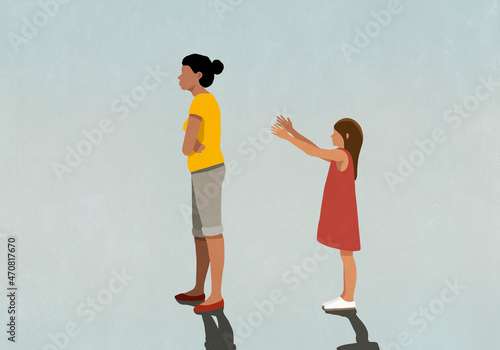 Mother ignoring daughter with arms outstretched
 photo