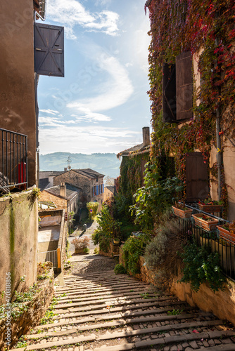 Old street and house facade in the medieval village of Cordes sur Ciel, in the Tarn, in Occitanie, France