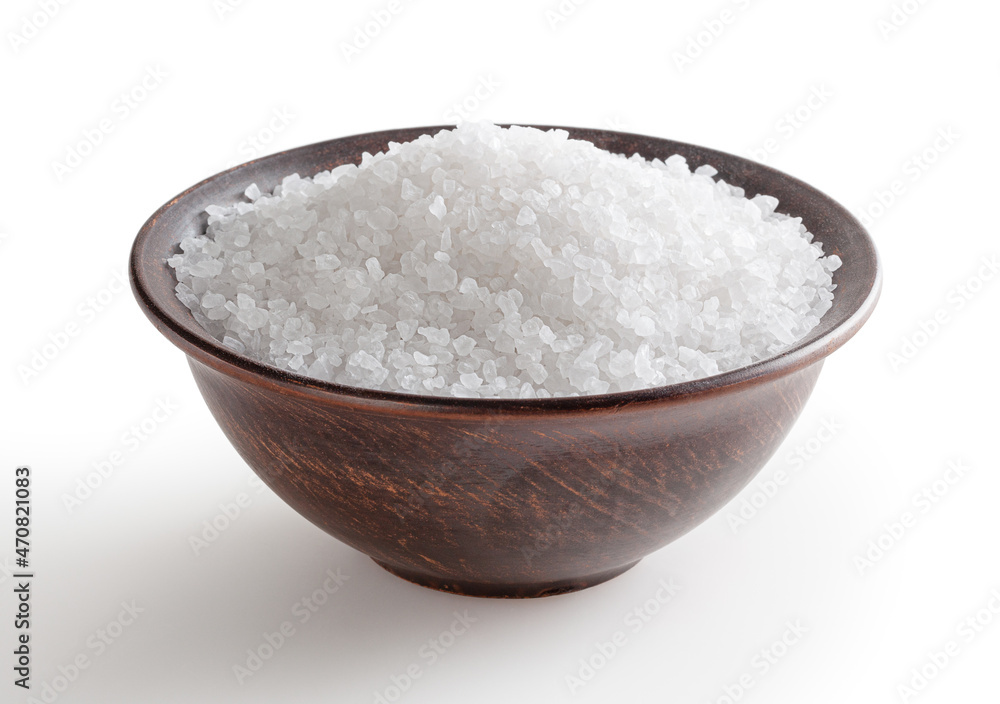 Sea salt in ceramic bowl isolated on white background with clipping path