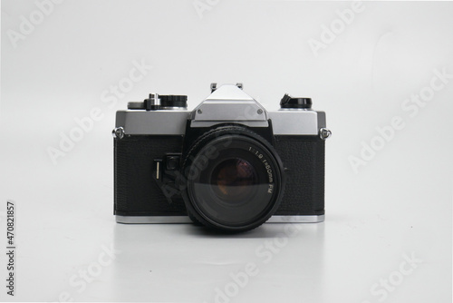 Close up of old camera isolated with white background. Vintage camera. Photography equipment