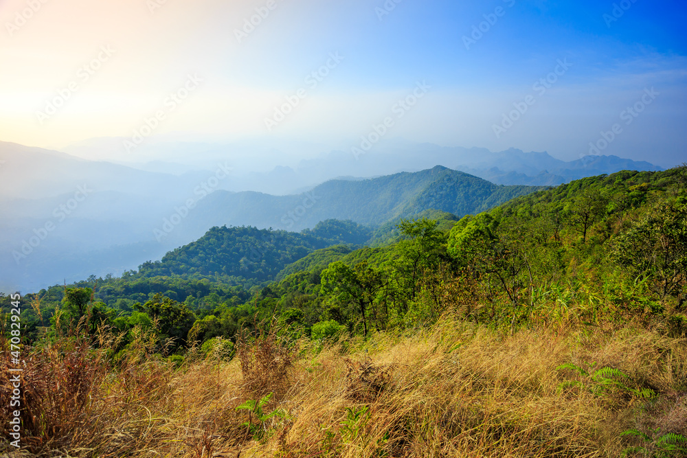 World environment day concept: Green mountains and beautiful blue sky clouds 